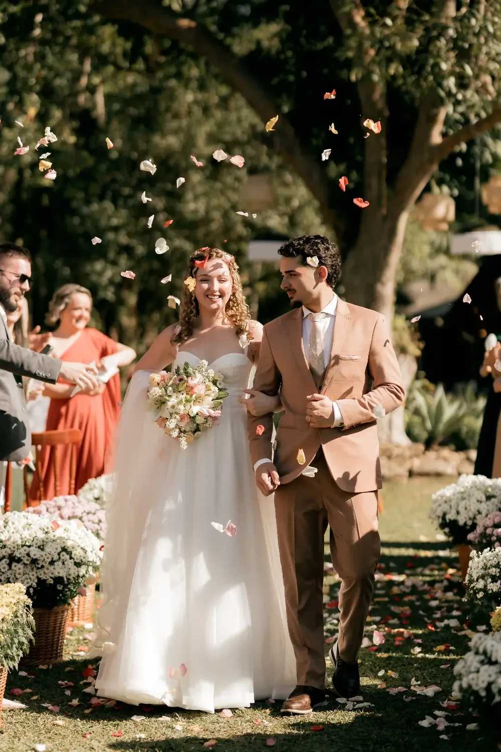 Coordinating wedding gown and tuxedo details