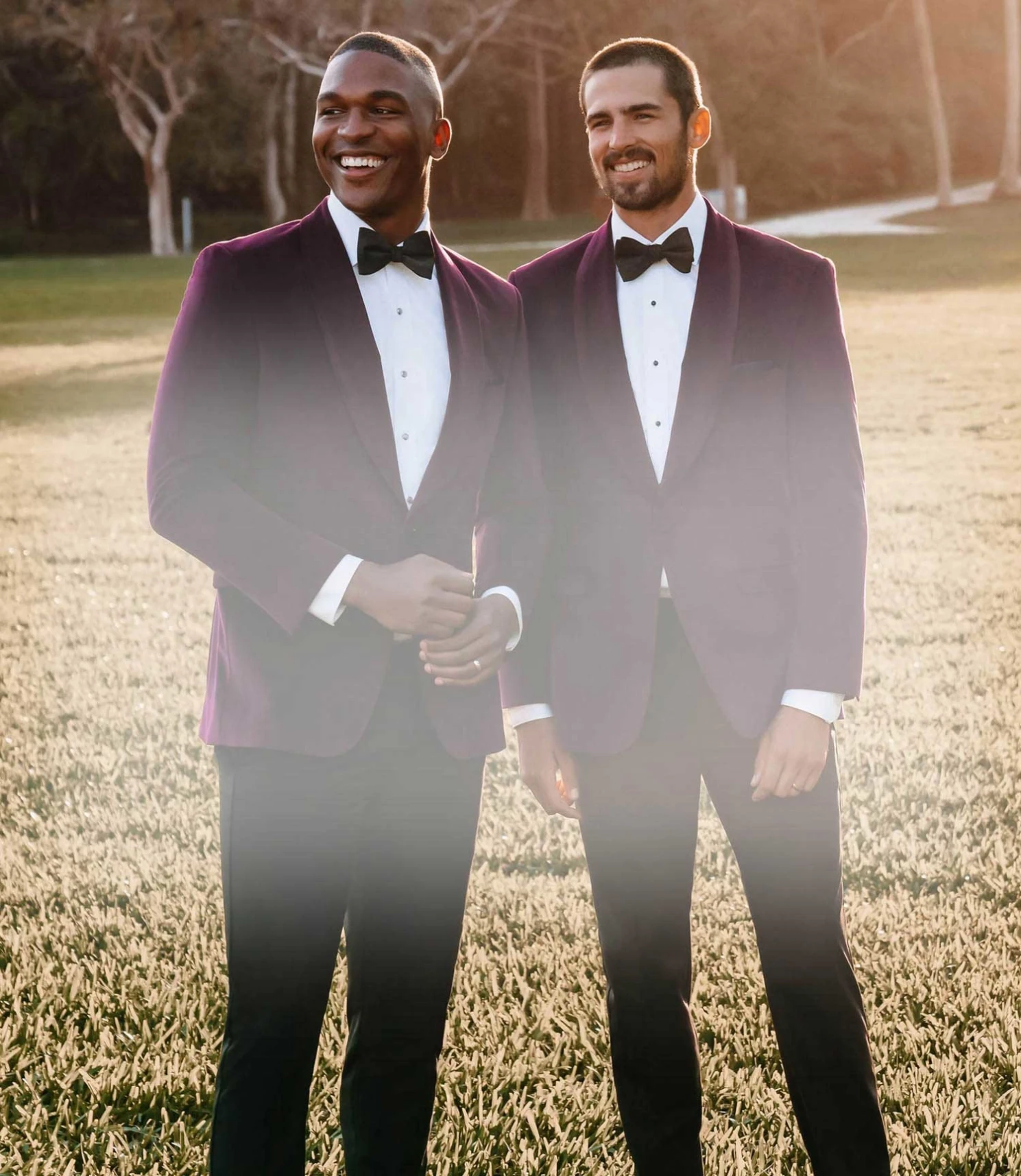 Models wearing the pink suits. Mobile image